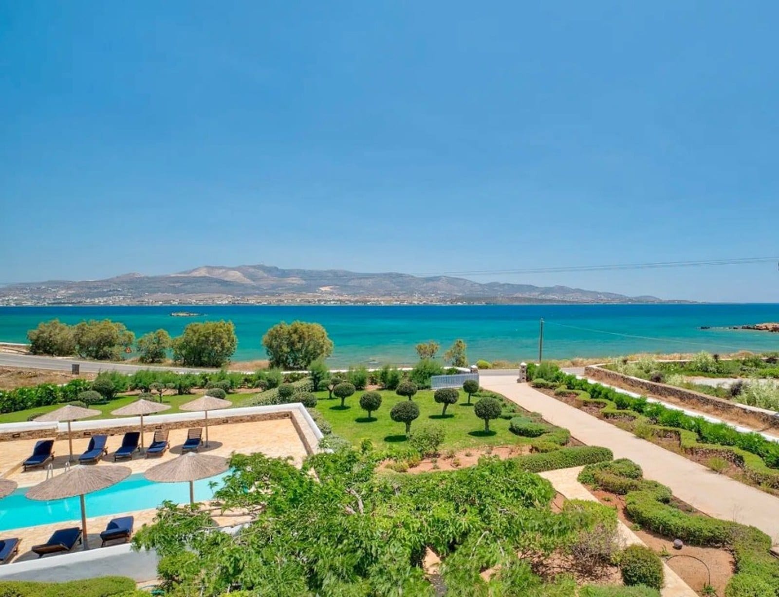 Villa Afroditi estate view over pool, gardens, and sea